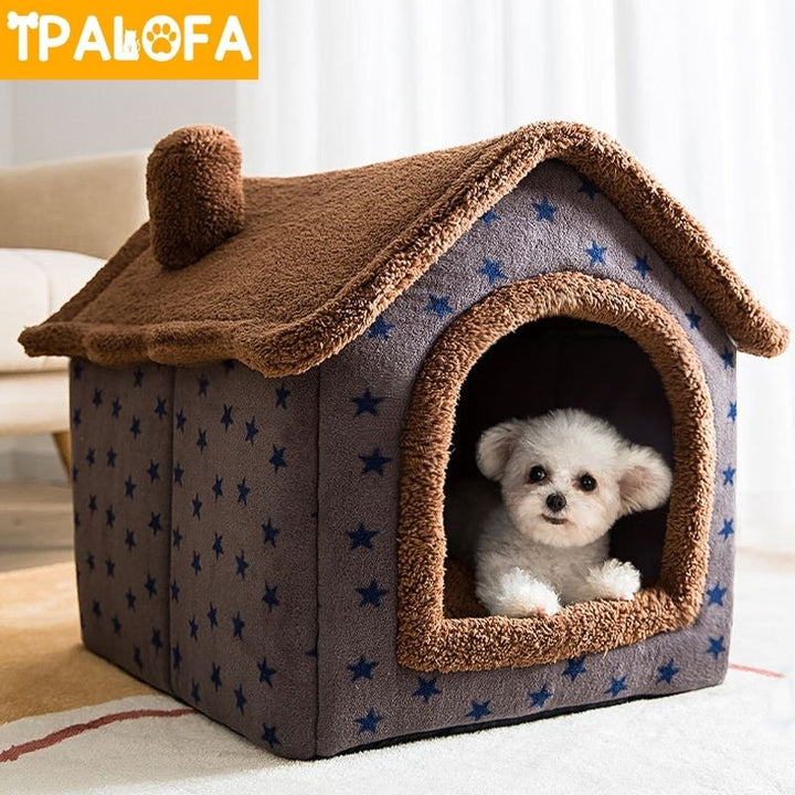 Acogedora casa para gatos de invierno